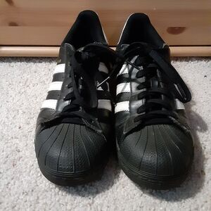 Adidas Black with White Stripes and gold logo Rockstar Sneakers size 8.5